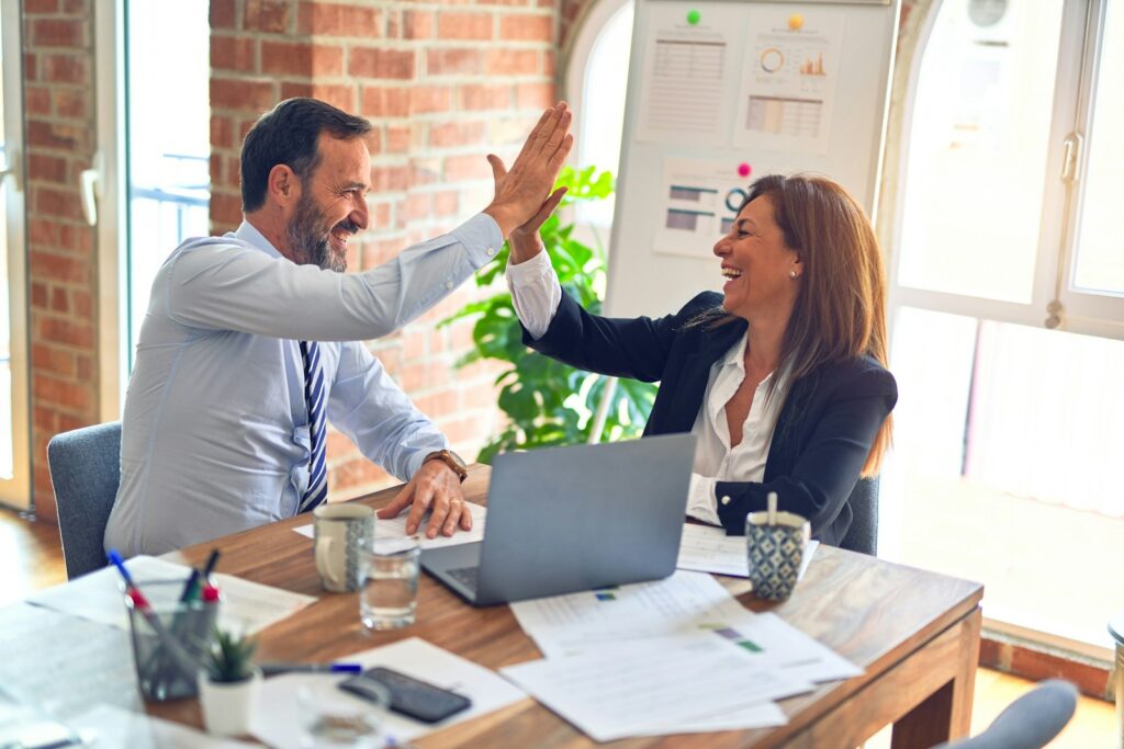Loan Assure consultant discussing personal loans and business loans with a client